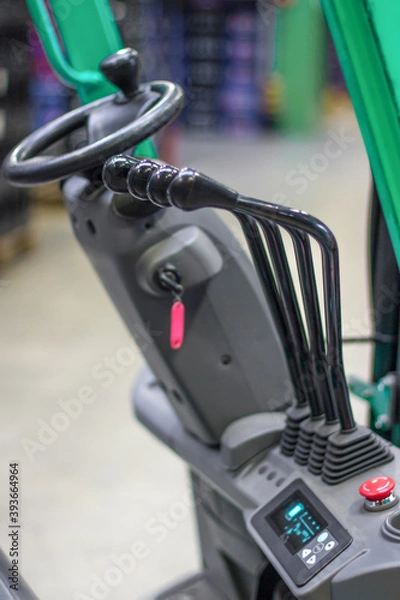 Fototapeta loader steering with control levers.