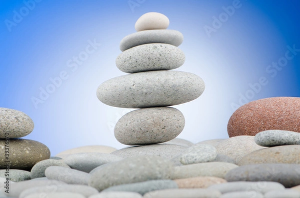 Fototapeta Pebbles stack against gradient background