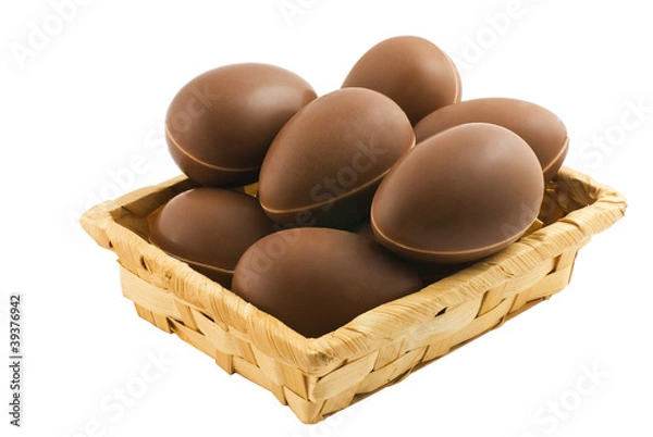 Obraz chocolate eggs in a wicker basket