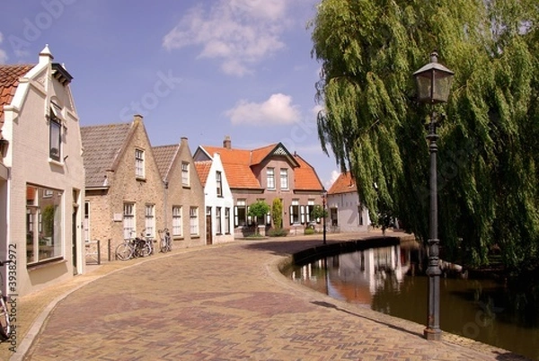 Fototapeta Houses in the village Dirksland in the Netherlands