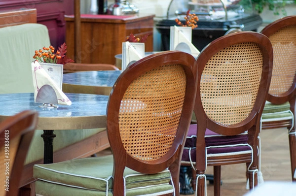 Obraz table and chairs in a restaurant