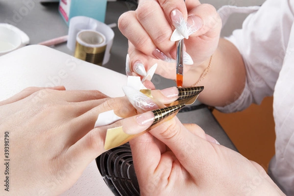 Obraz Manicure. Master make nail extension