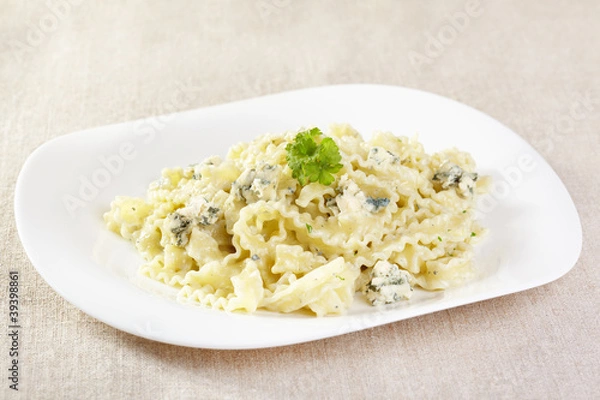 Obraz European cuisine. Pasta in cream sauce with blue cheese