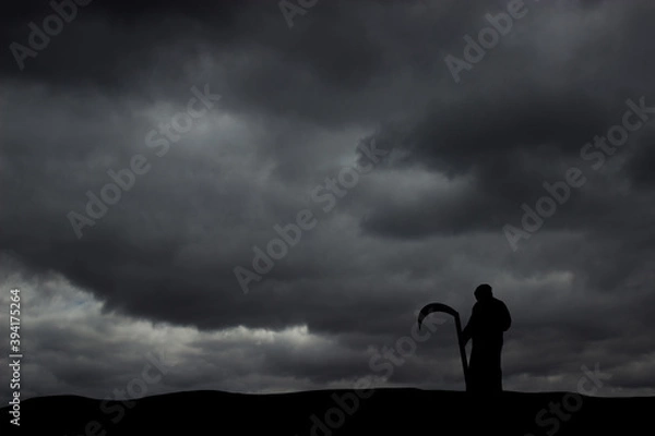 Obraz Grim reaper on sky backround