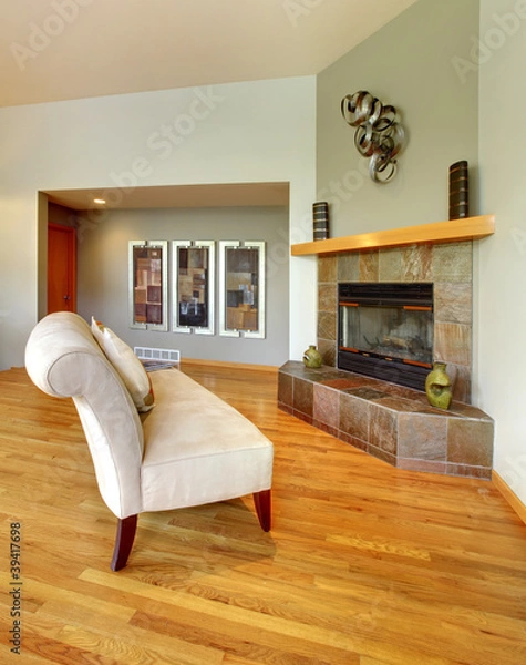 Fototapeta Elegant chair and fireplace living room interior.