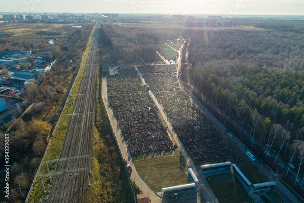 Obraz Aerial view of fresh graves in the Butovo cemetery on the outskirts of Moscow on November 09, 2020.
