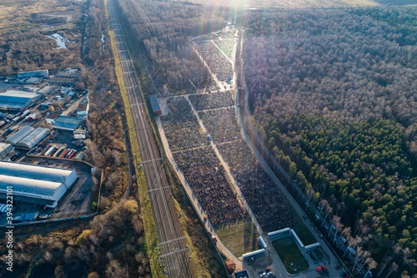 Obraz Aerial view of fresh graves in the Butovo cemetery on the outskirts of Moscow on November 09, 2020.