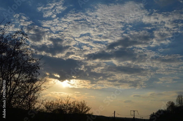 Fototapeta sunset in the clouds