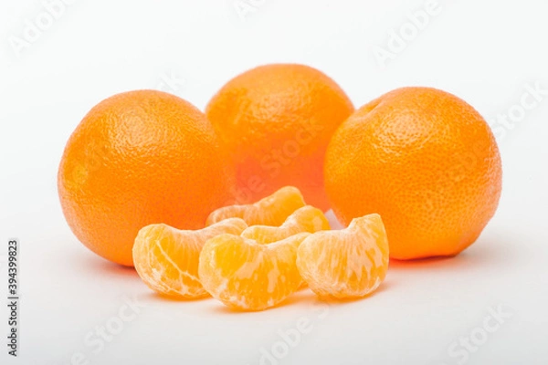 Obraz Fresh ripe orange fruits and orange slice isolated on the white background