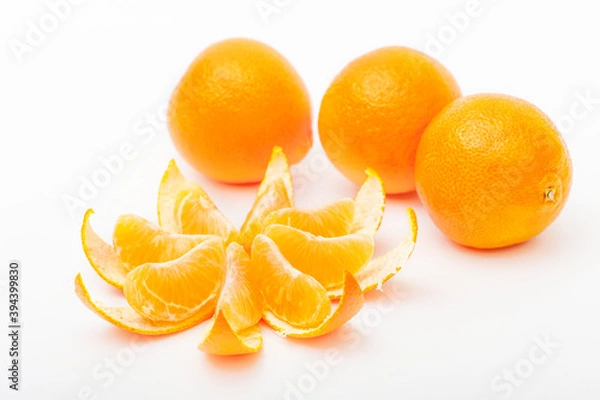 Obraz Fresh ripe orange fruits and orange slice isolated on the white background