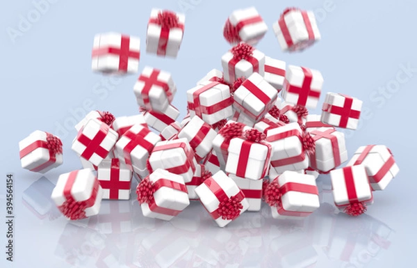 Obraz Falling Christmas gift boxes with red bows and ribbons on gray background