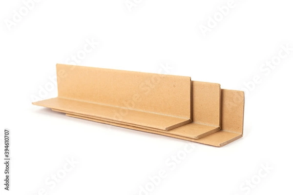 Obraz Cardboard edge protectors isolated on white - corner-edge protection while transportation goods. Recyclable packaging products