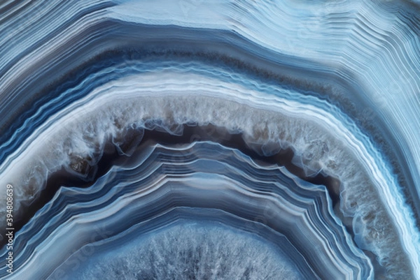 Obraz Full-screen close-up texture of translucent white-blue agate with a concentric pattern and ghostly quartz crystals
