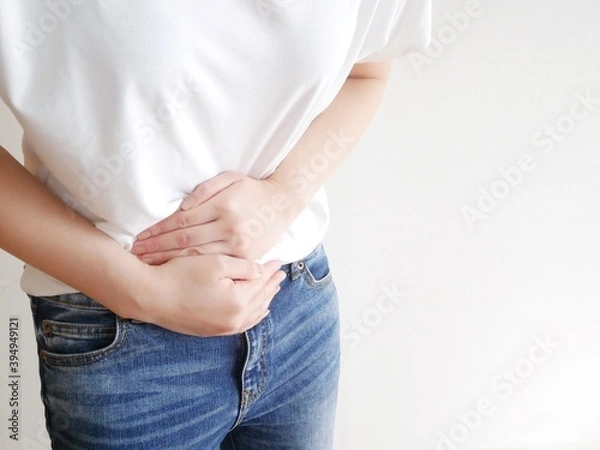 Obraz お腹が痛い女性
