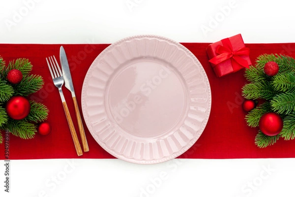 Obraz Table setting with spruce, plate, flatware on white background top view
