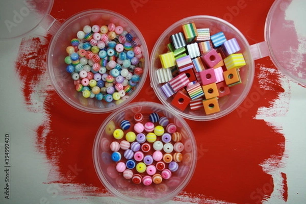 Obraz Beads in a box of different colors.
