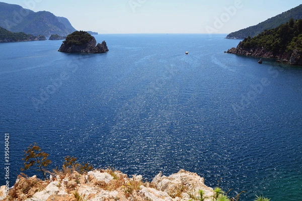 Fototapeta Top view of the sea, mountains and a small island