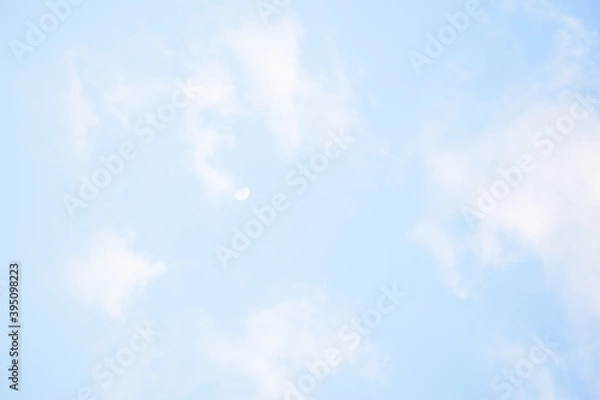 Obraz Blue sky with puffy white clouds.