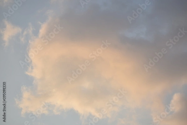 Fototapeta Blue sky with puffy white clouds.