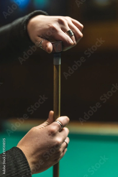 Obraz chalking up a pool cue