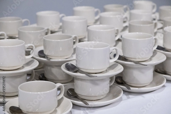 Fototapeta catering, many small white cups with spoons