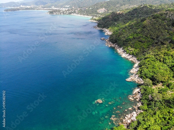 Fototapeta Top view aerial photo from flying drone of an amazing seascape with paradise beach and sea with turquoise water. Summer vacation holidays in Thailand. Perfect website background with copy space area.