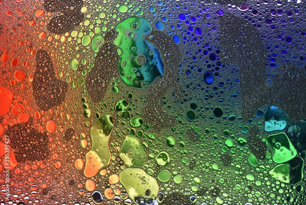 Fototapeta Oil in water. Multi coloured abstract background.