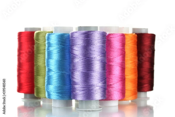 Obraz bright bobbin thread isolated on white.