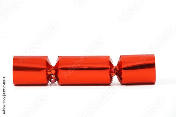 Obraz Close-up view of a festive Christmas cracker isolated against a white background.