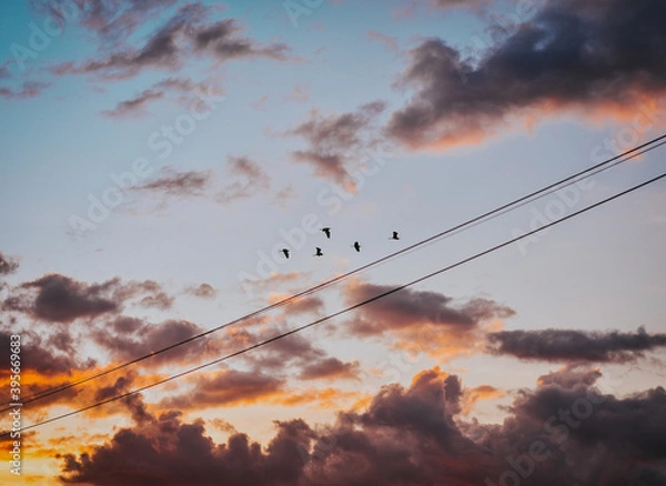 Obraz time clouds over the city