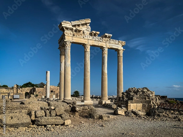 Fototapeta The ruins and columns of majestic Apollo temple in Side Antalya Turkey with a blue sunny sky background