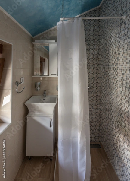Obraz  bathroom in blue and gray tones with mosaic, shower and white sink