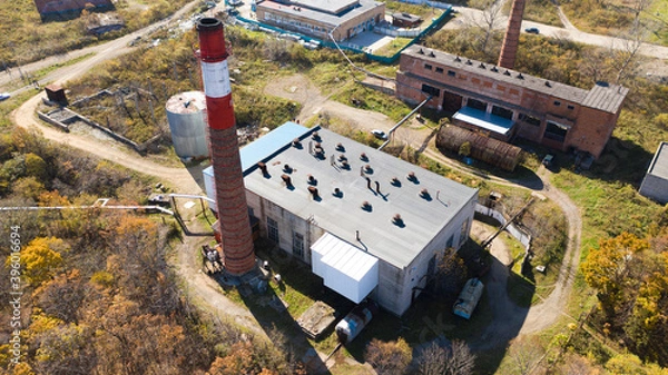 Fototapeta Boiler room with a pipe photographed on a drone