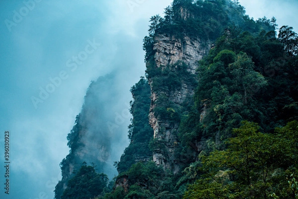 Fototapeta Amazing landscape of mountain and forest in the foggy at Wulingyuan, Hunan, China. Wulingyuan Scenic and Historic Interest Area which was designated a UNESCO World Heritage Site in China