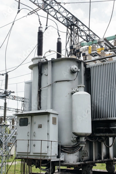 Fototapeta Power transformer at the electrical substation. Power engineering. Industry