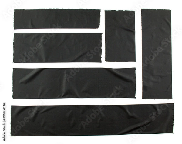 Fototapeta Set of torn and crumpled pieces of black adhesive tape on white background. Creased different size black sticky tape.