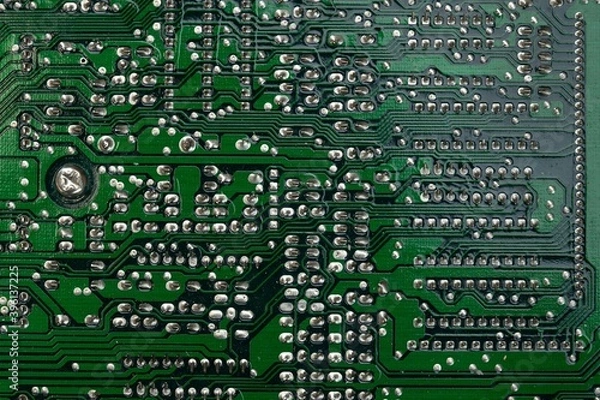 Fototapeta Scrap yard printed circuit board electronic waste for recycling with selective focus. main board electronic waste