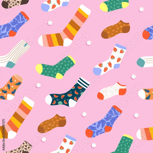 Fototapeta Trendy Christmas socks seamless pattern. Cute hand drawn cartoon socks on pink background. Variety of funny socks. Modern illustration for stationery, web, textile, wrapping paper