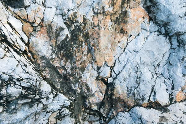 Fototapeta Gray and Pinkish gray colour Permian Rocks texture and background. Permian massive limestone at Khao Sam Roi Yot National Park, Prachuap Khiri Khan, Thailand.