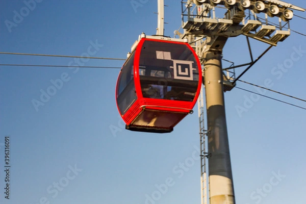 Obraz Suspension, cable car, funicular cab in red.