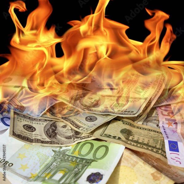 Obraz an image of  dollar and euro bills on fire