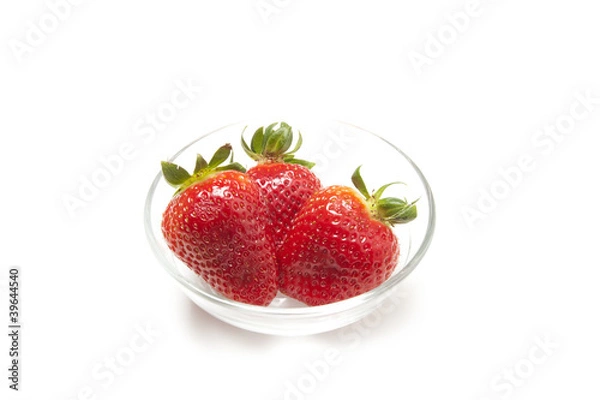 Fototapeta Three strawberries on white background