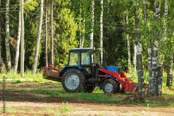 Obraz Tractor working in the forest