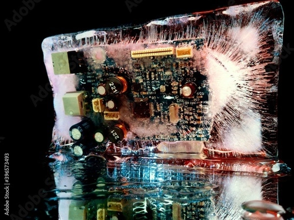 Fototapeta electrical board frozen in ice like a city shining with night lights