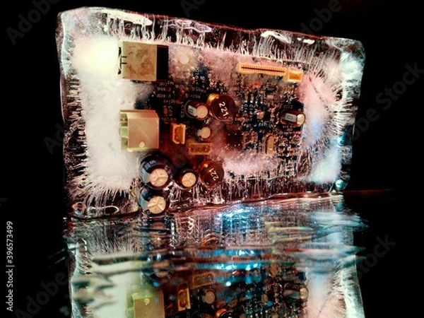 Fototapeta creative macro photography of an electrical circuit board glowing in the dark like a night city
