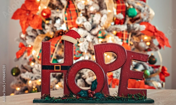 Fototapeta Hope with Christmas tree background and beautiful colors