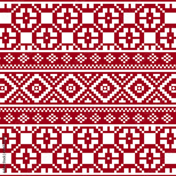 Fototapeta Knitted seamless pattern in red with snowflakes.