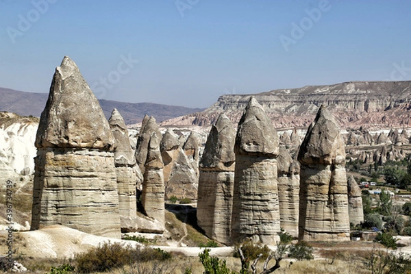 Obraz Unusually shaped cliffs of volcanic origin in the Love Valley in the Cappadocia region in Turkey.