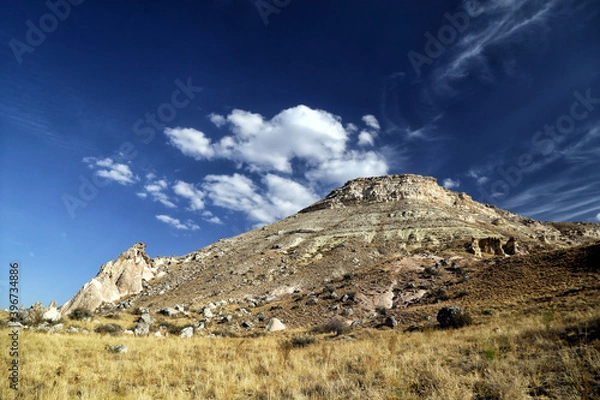 Obraz Unusually shaped cliffs of volcanic origin in the Pashabag Valley in the Cappadocia region in Turkey.