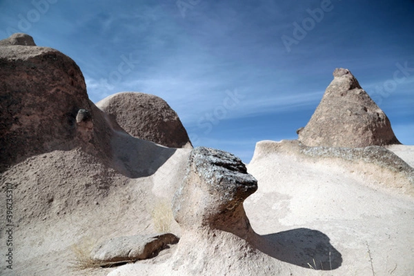 Obraz Unusually shaped cliffs of volcanic origin in the Dervent Valley in the Cappadocia region in Turkey.